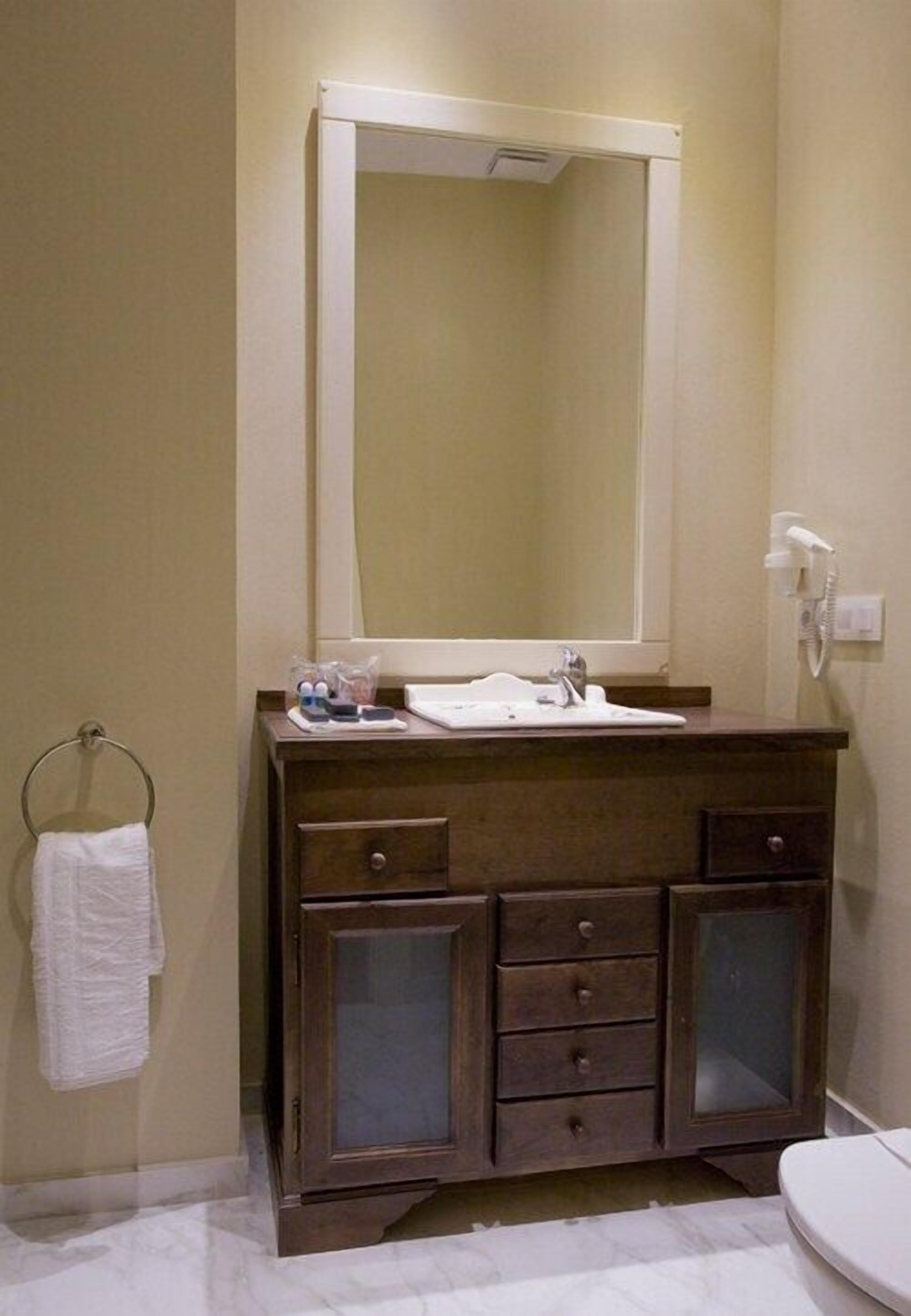 shower, rainfall showerhead, designer toiletries, hair dryer