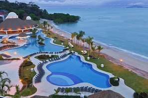 3 outdoor pools, pool umbrellas, sun loungers