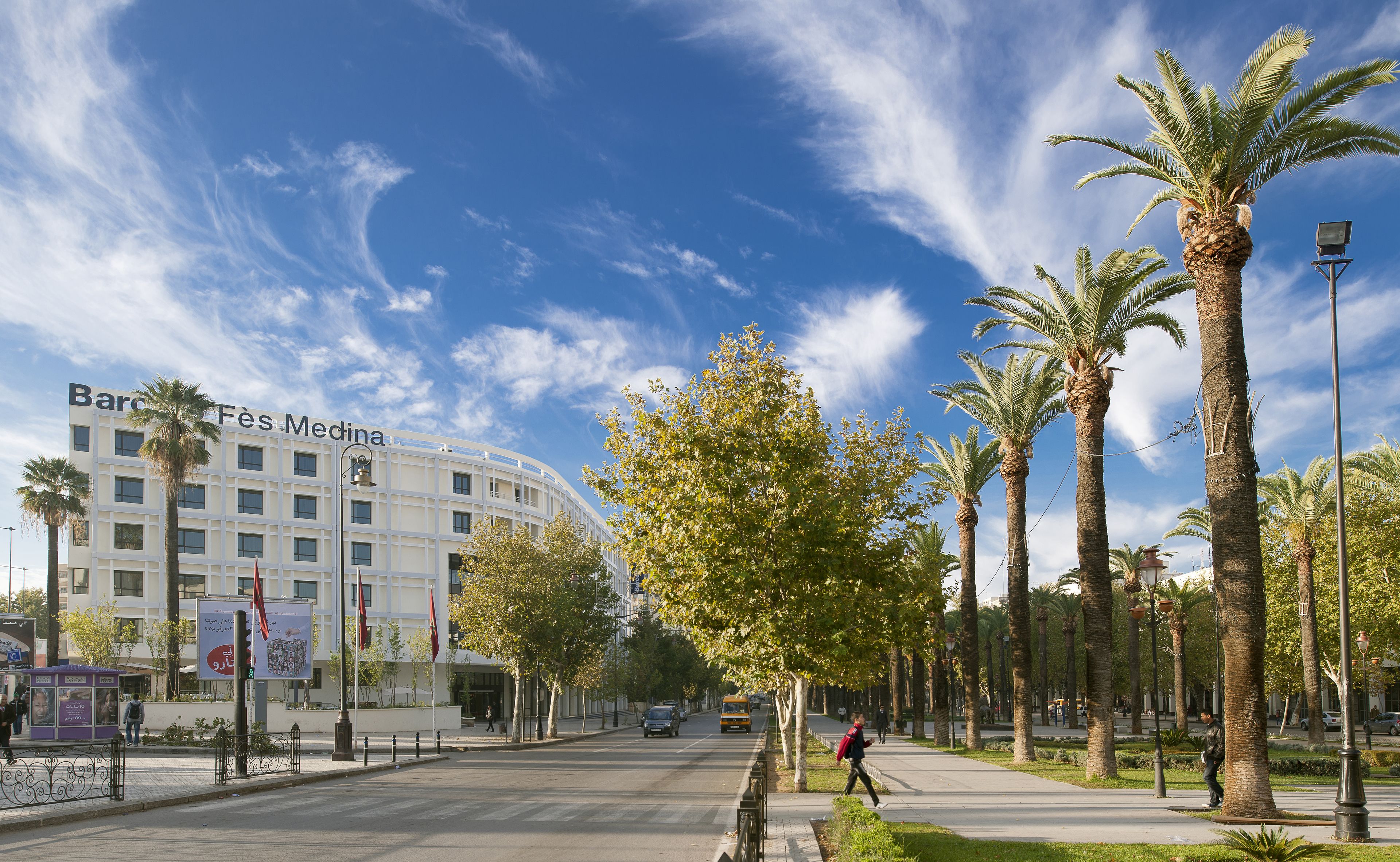 A building with a sign reading "Barbès Médina".