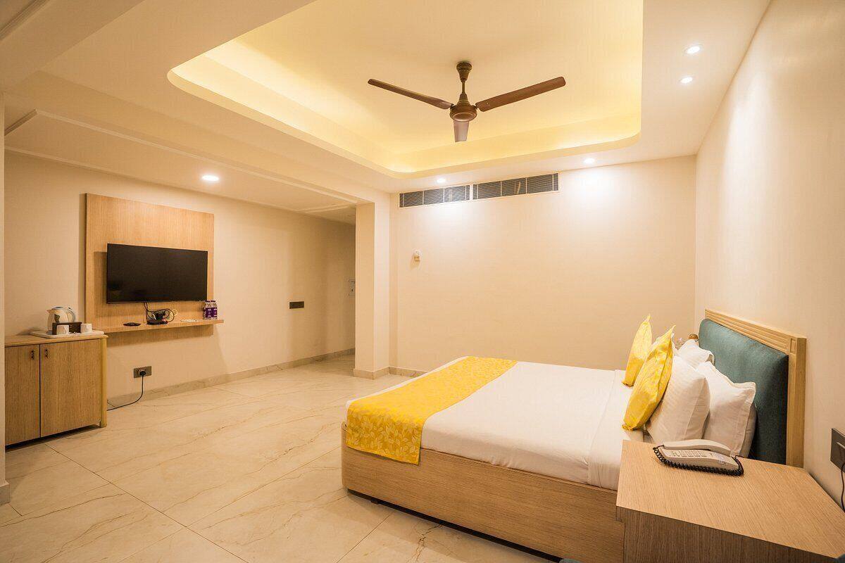 Monolocale Executive, 1 letto queen, fumatori, vista città | Biancheria da letto di alta qualità, minibar, una cassaforte in camera