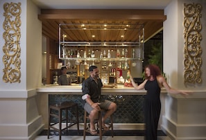 2 bars/lounges, swim-up bar, poolside bar