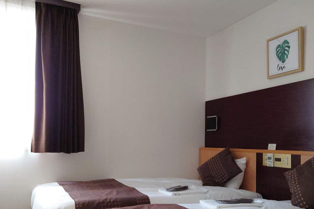Premium bedding, down comforters, desk, blackout drapes