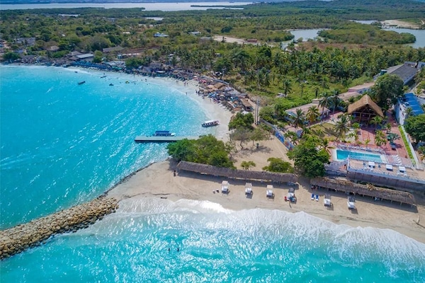 Beach nearby, free beach cabanas, beach towels, beach volleyball
