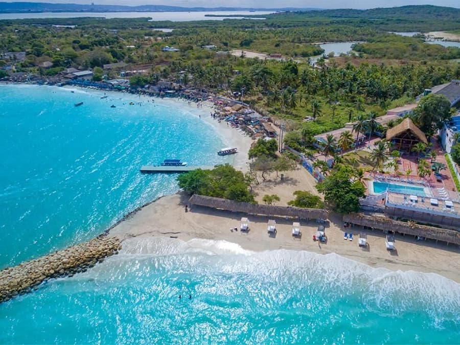 On the beach, free beach cabanas, beach towels, beach volleyball