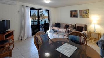 Standard Apartment, 1 Bedroom, Balcony, River View | Living area