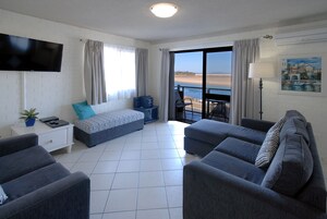 Superior Apartment, 2 Bedrooms, Ocean View | Iron/ironing board, free cribs/infant beds, rollaway beds, free WiFi