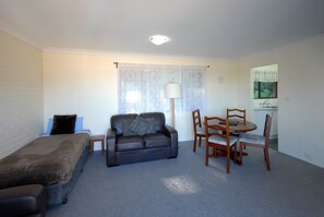 Standard Apartment, 1 Bedroom, Balcony, River View | Living area