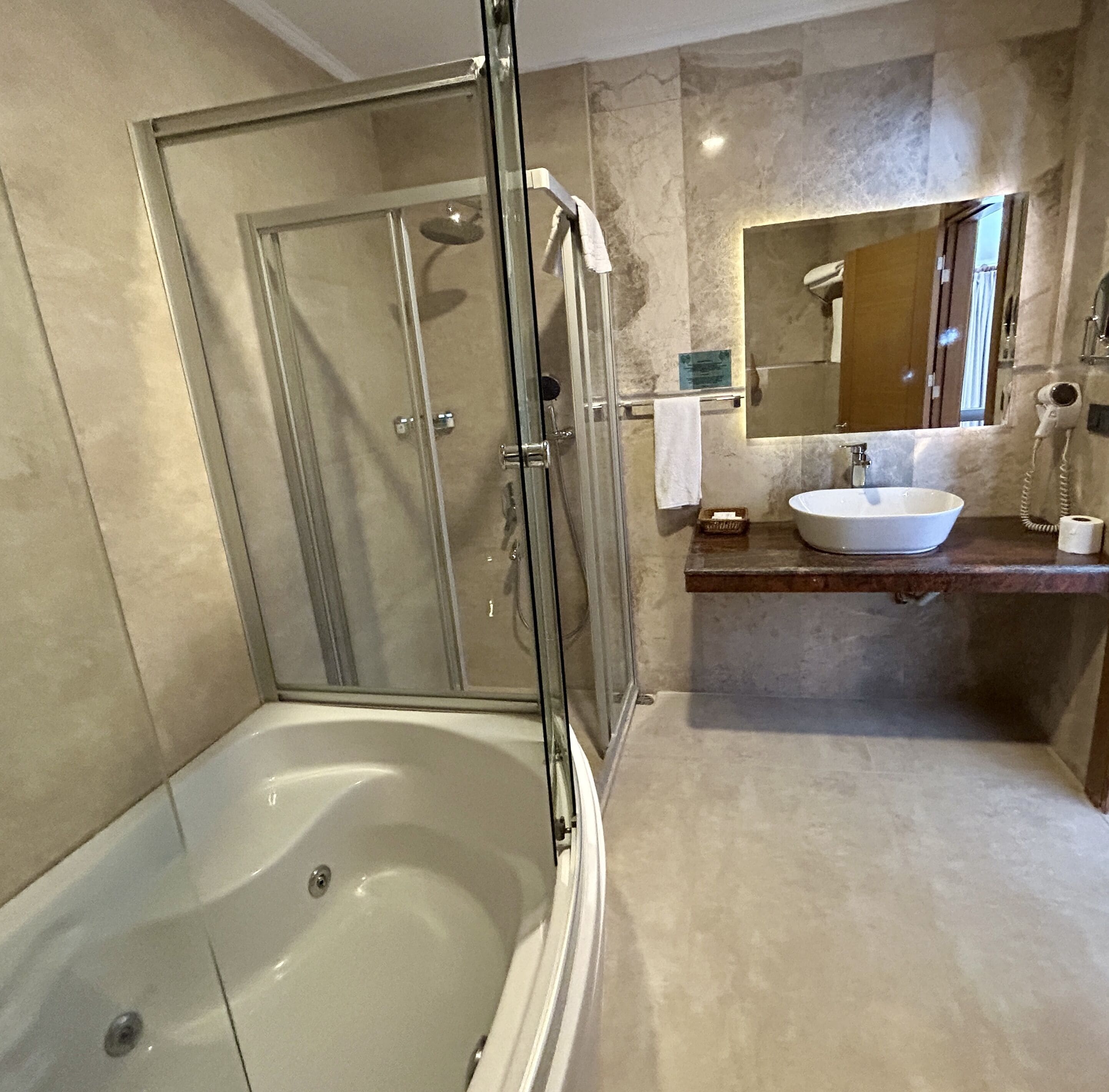 family room | bathroom | shower, free toiletries, hair dryer, slippers