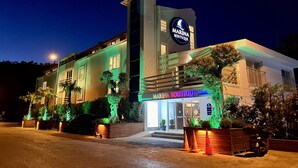 A two-story building with a sign reading "Marina Boutique Hotel". - Marina Boutique Fethiye - Boutique Class (Fethiye)