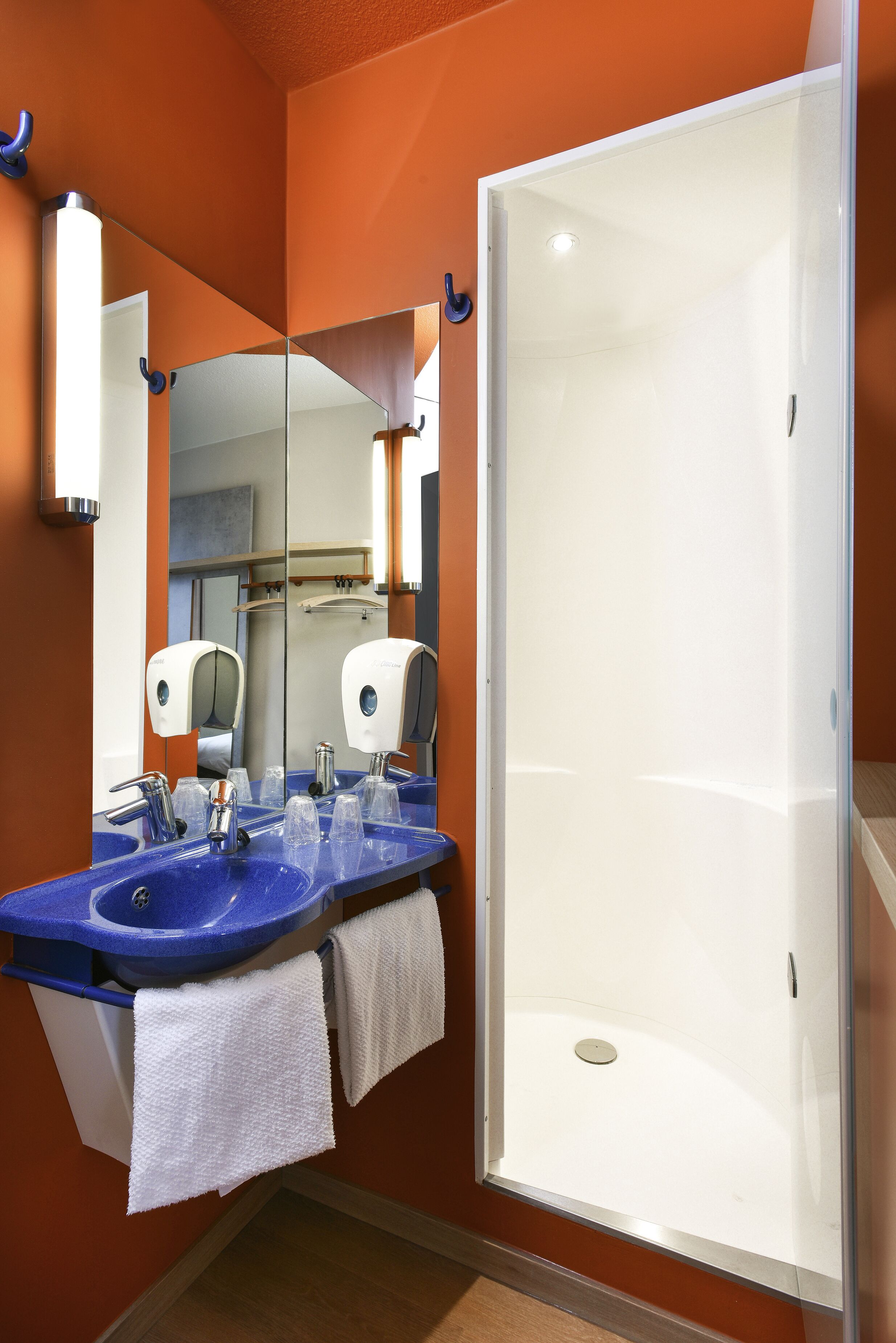 shower, eco-friendly toiletries, hair dryer, towels