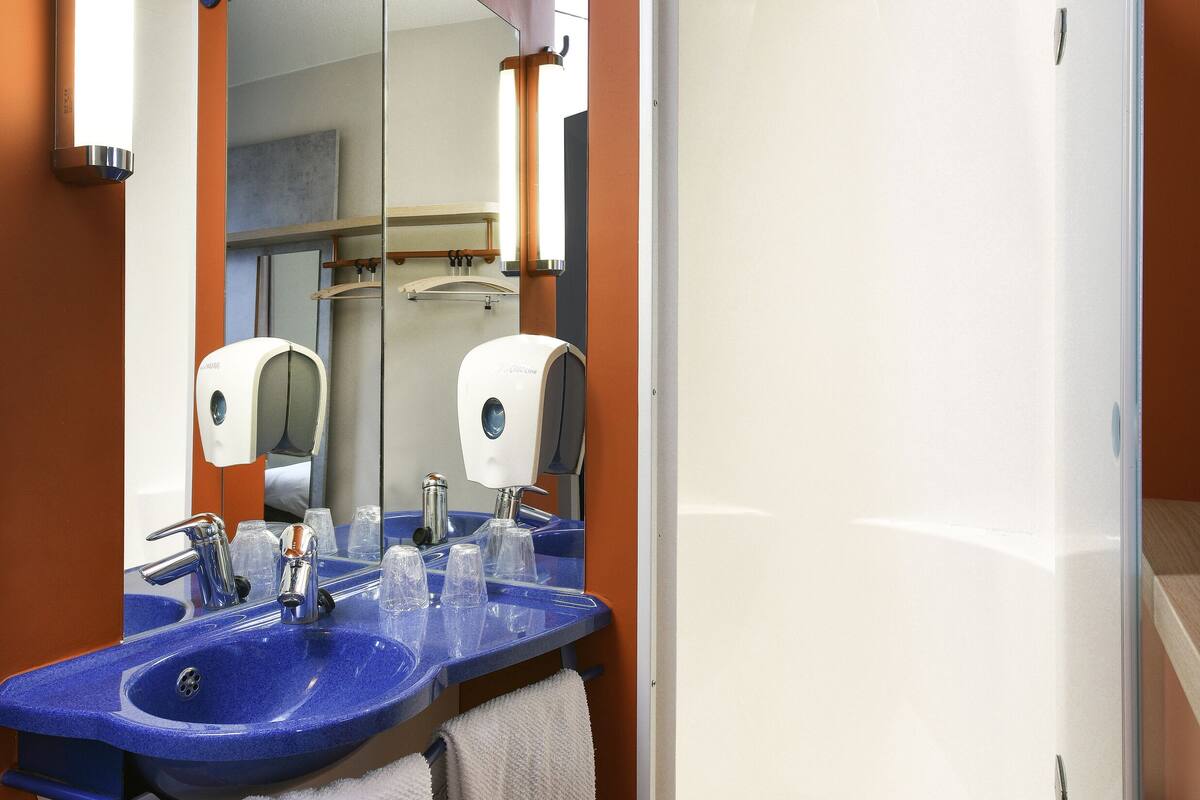 shower, eco-friendly toiletries, hair dryer, towels