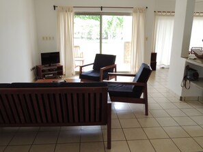 Condo, 2 Bedrooms, Garden Area | Living area - Hacienda Iguana Beach and Golf Resort (Tola)