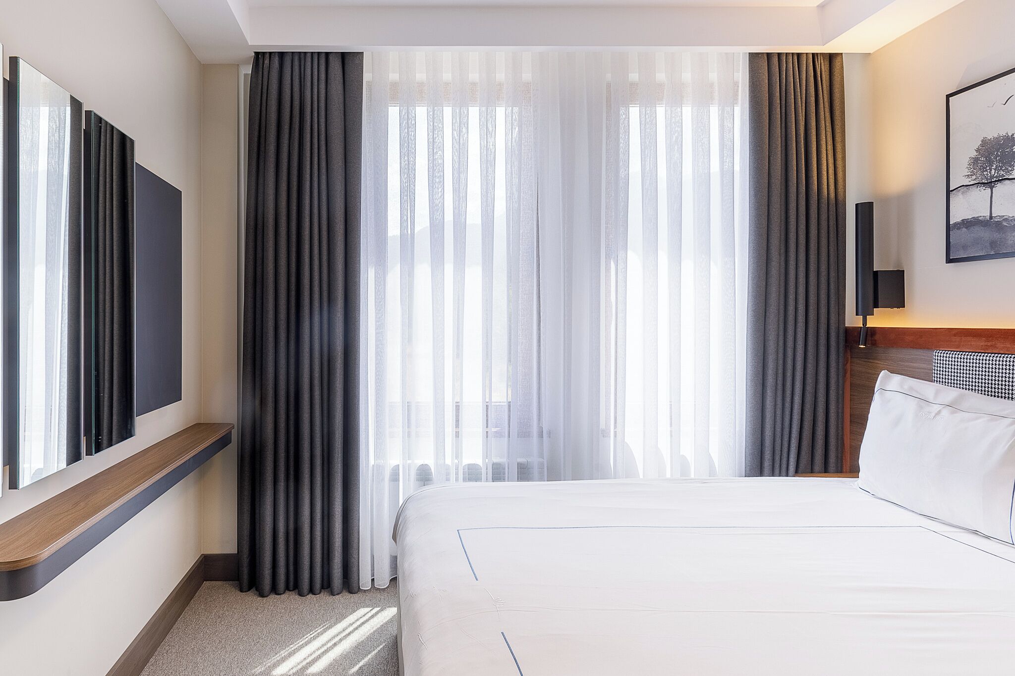 desk, blackout curtains, soundproofing, rollaway beds