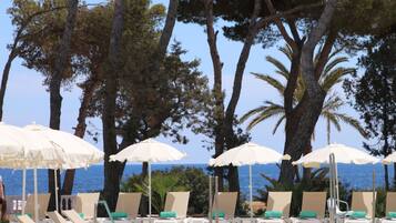 Outdoor pool, pool umbrellas, pool loungers