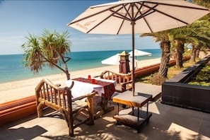 On the beach, sun loungers, beach umbrellas, beach towels