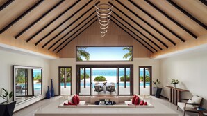 Ein modernes Interieur mit großem Fenster zum Pool und Meerblick, Holzbalkendecke und einer Sitzecke mit Aussicht.