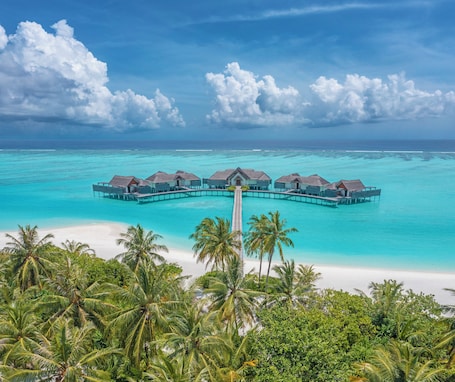Premium bedding, down comforters, memory foam beds, minibar. Niyama Private Islands Maldives