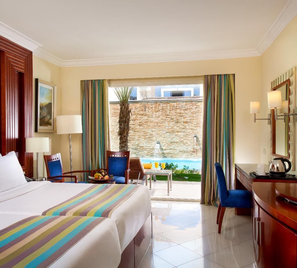 Egyptian cotton sheets, minibar, in-room safe, desk