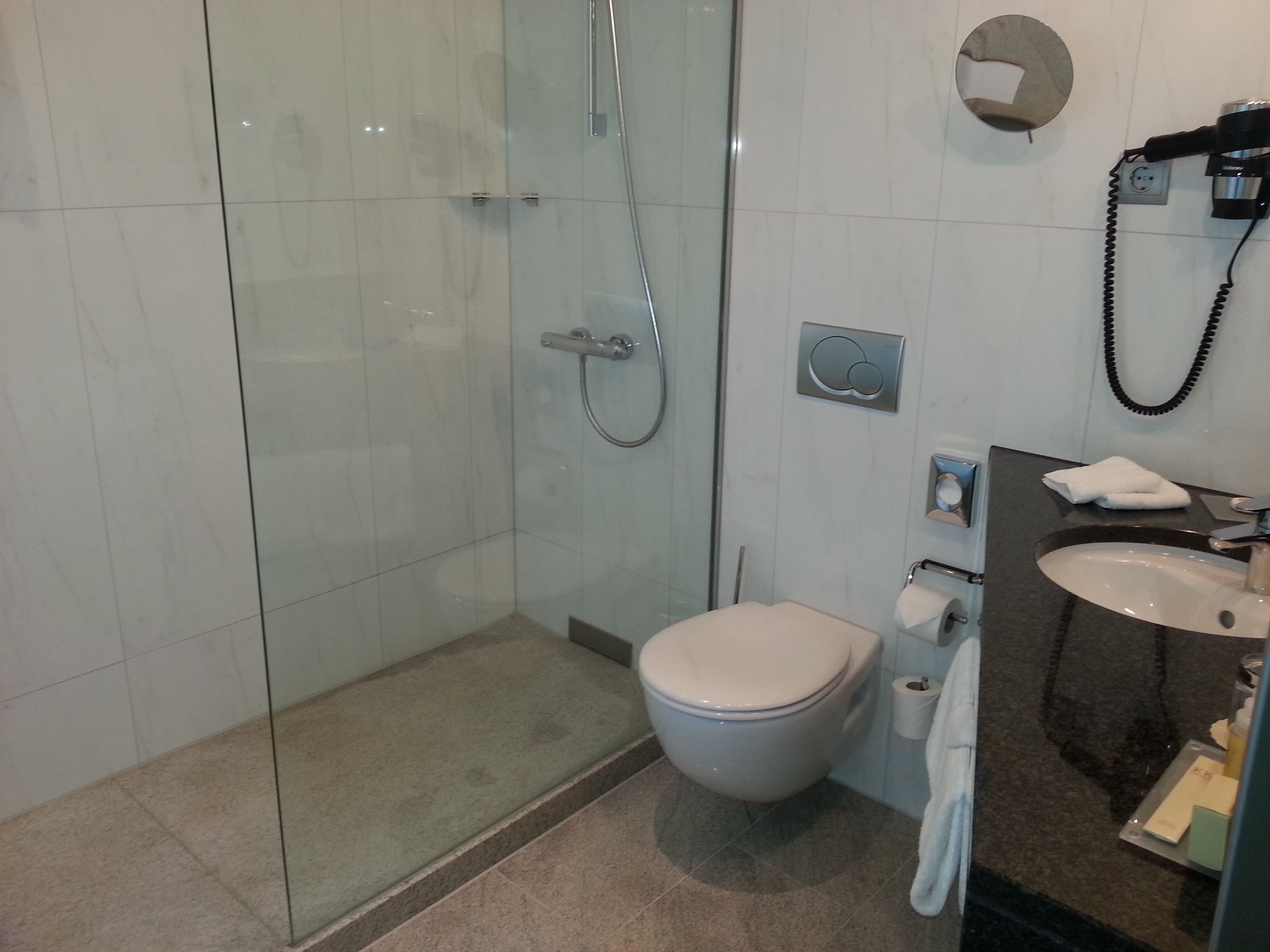 hydromassage showerhead, free toiletries, hair dryer, towels