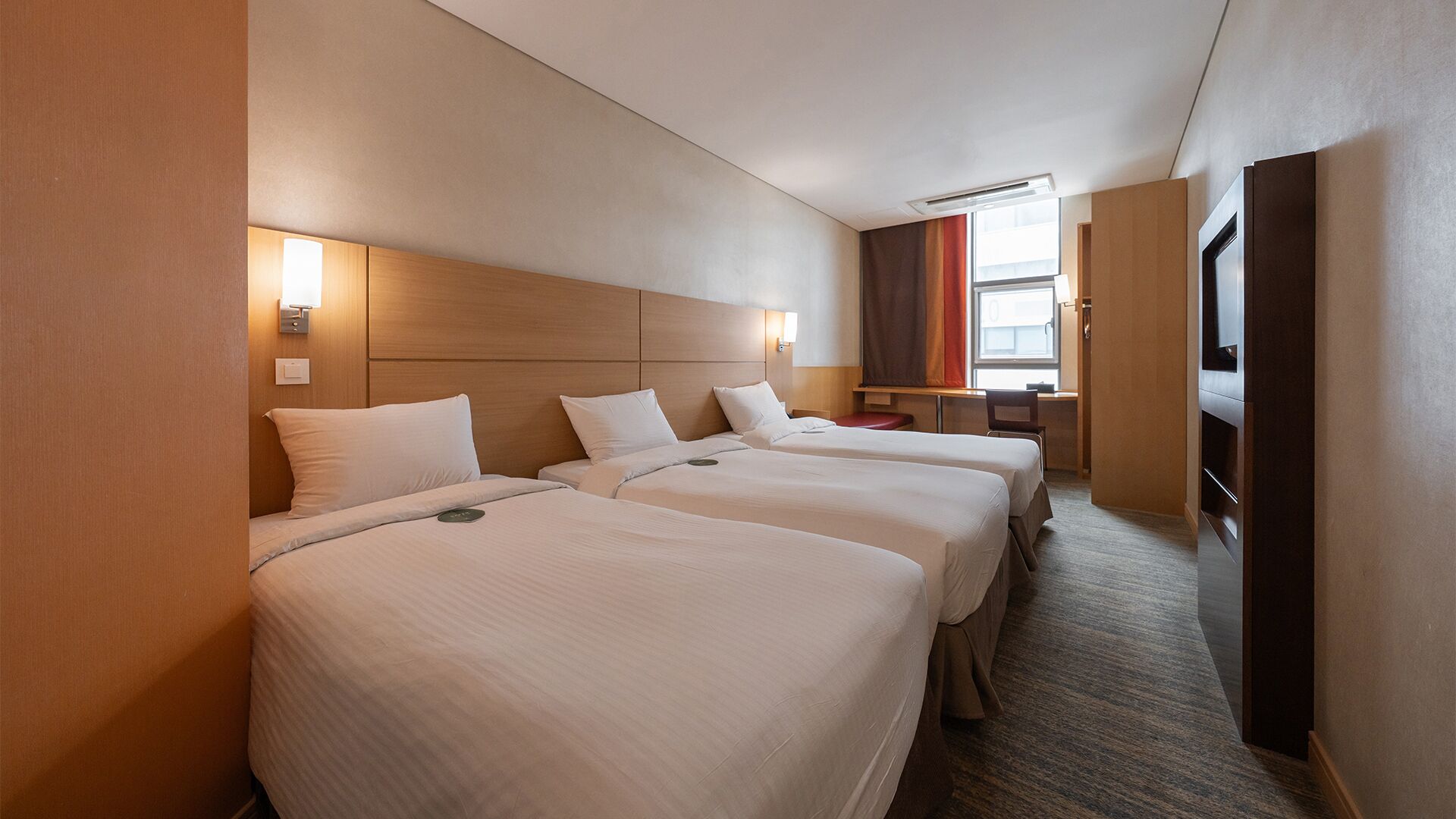 Standard Triple Room | In-room safe, desk, laptop workspace, blackout drapes