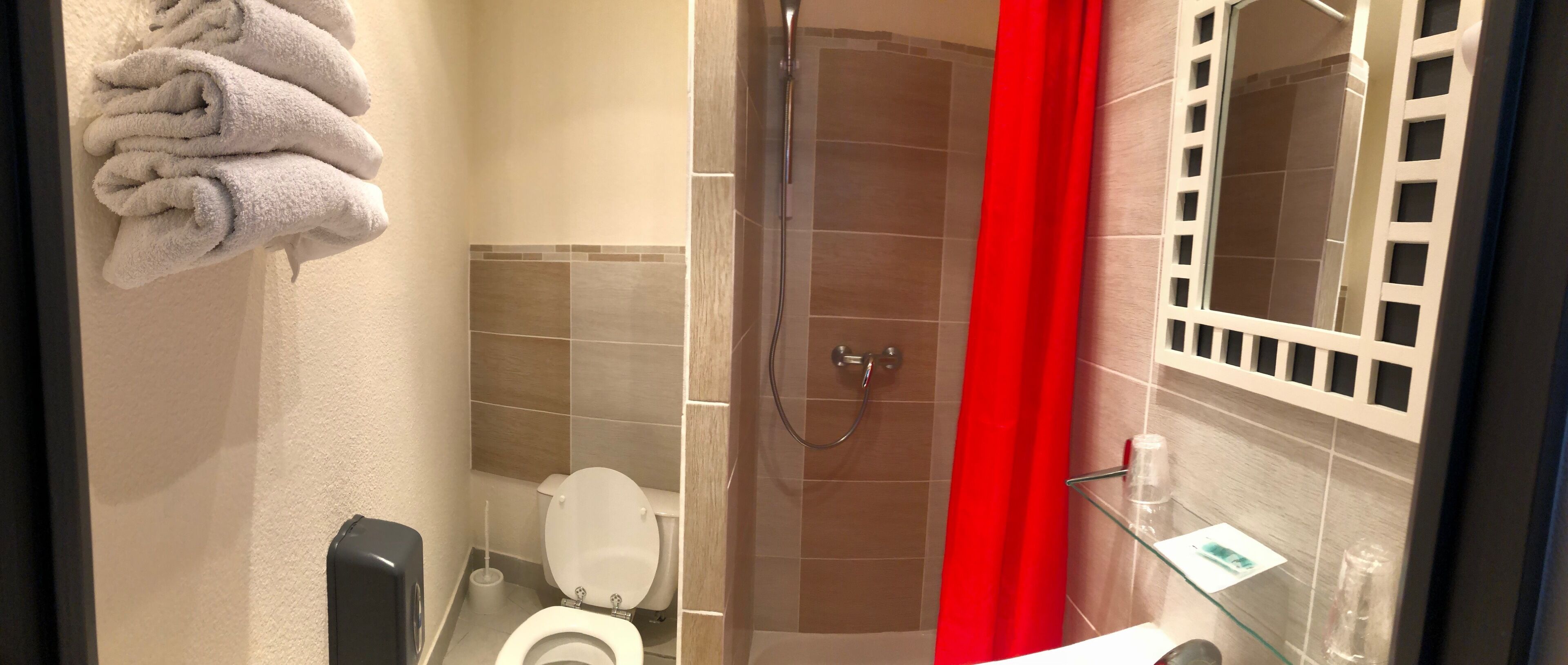double room with shower | bathroom | hair dryer, towels, soap, toilet paper