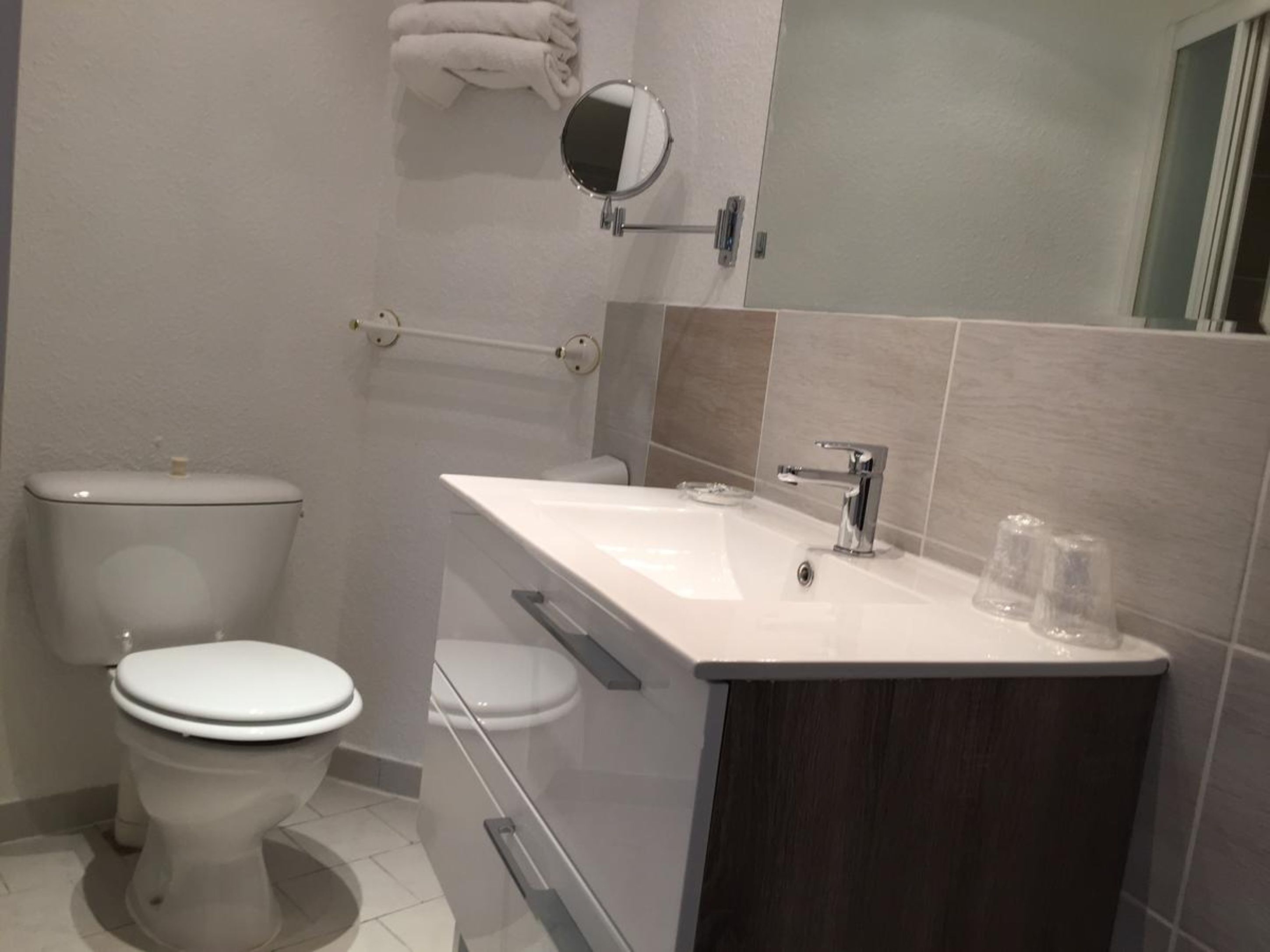 double room with shower | bathroom sink