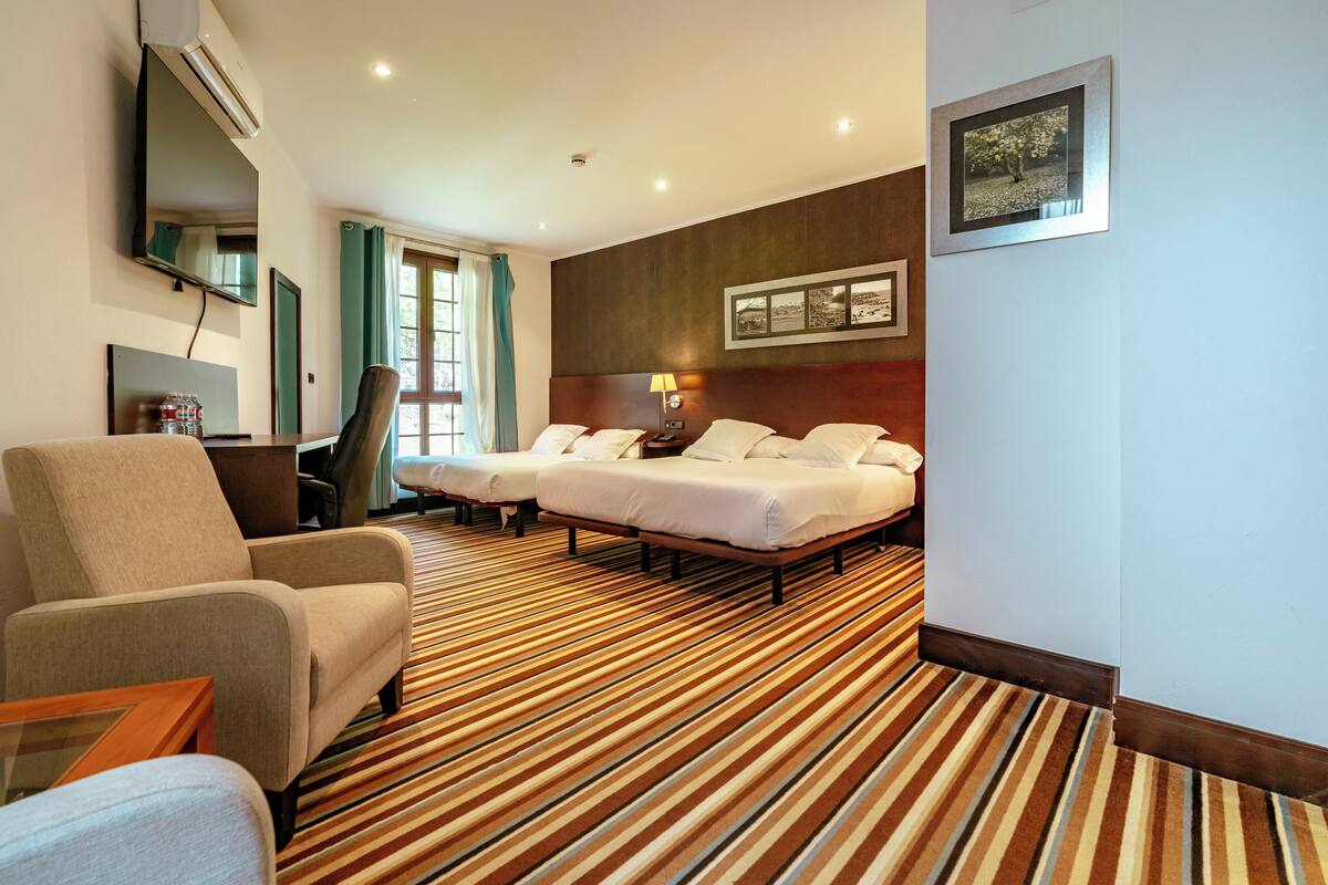Family Room | Egyptian cotton sheets, premium bedding, down comforters, minibar