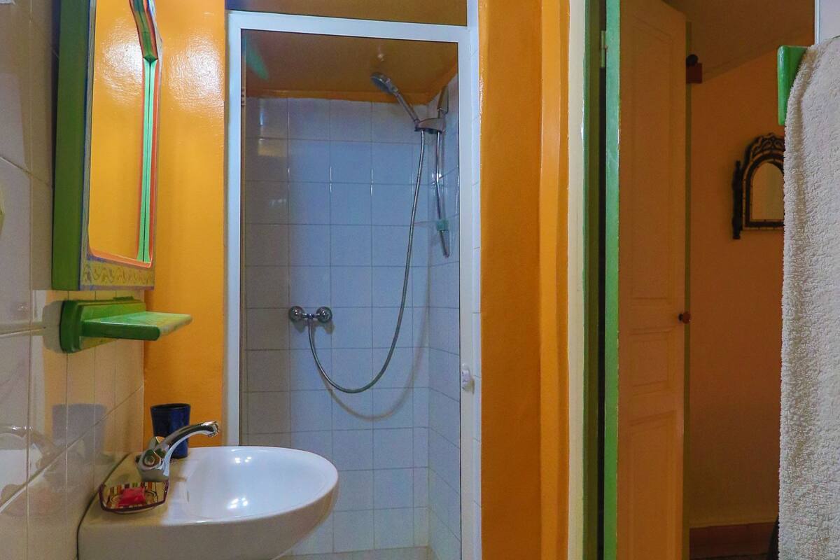 family suite, 2 bathrooms | bathroom | shower, free toiletries, hair dryer, towels