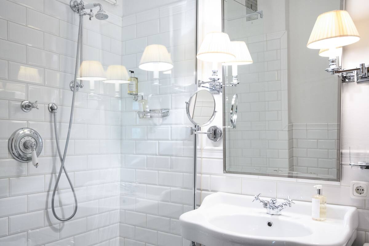 chalet classico | bathroom | designer toiletries, hair dryer, bathrobes, slippers