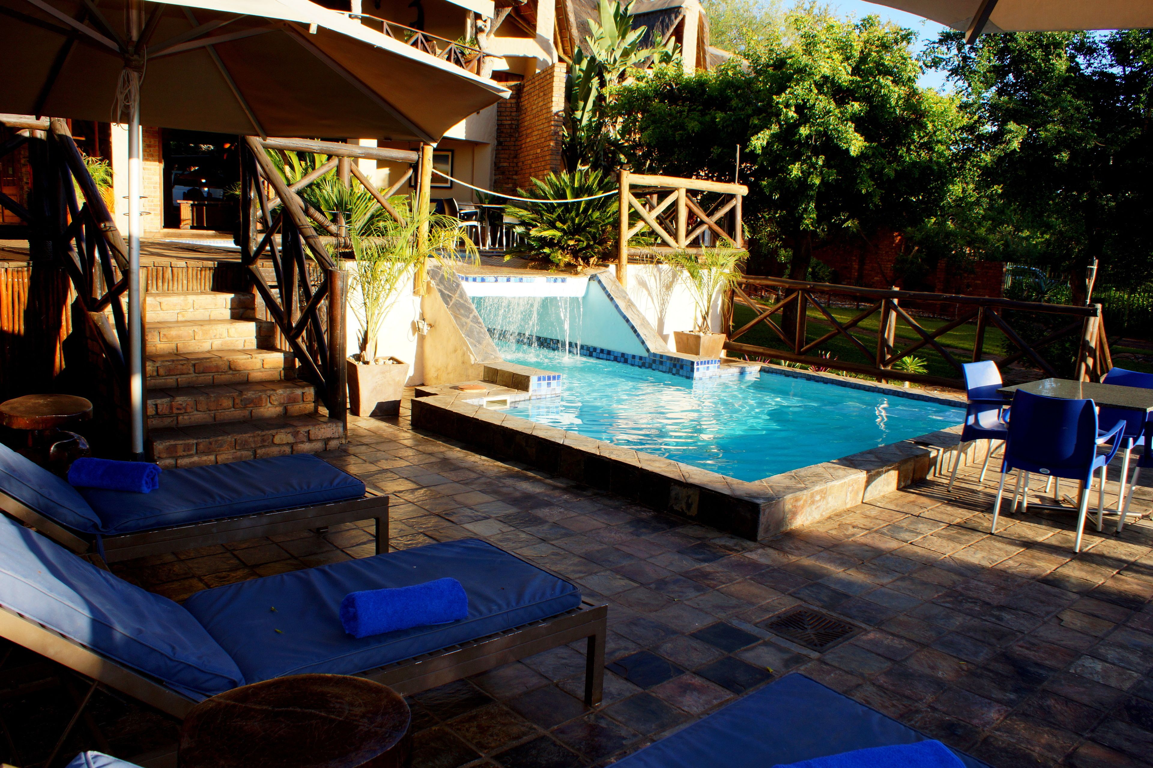 2 outdoor pools, open 6:00 AM to 7:30 PM, pool umbrellas, sun loungers