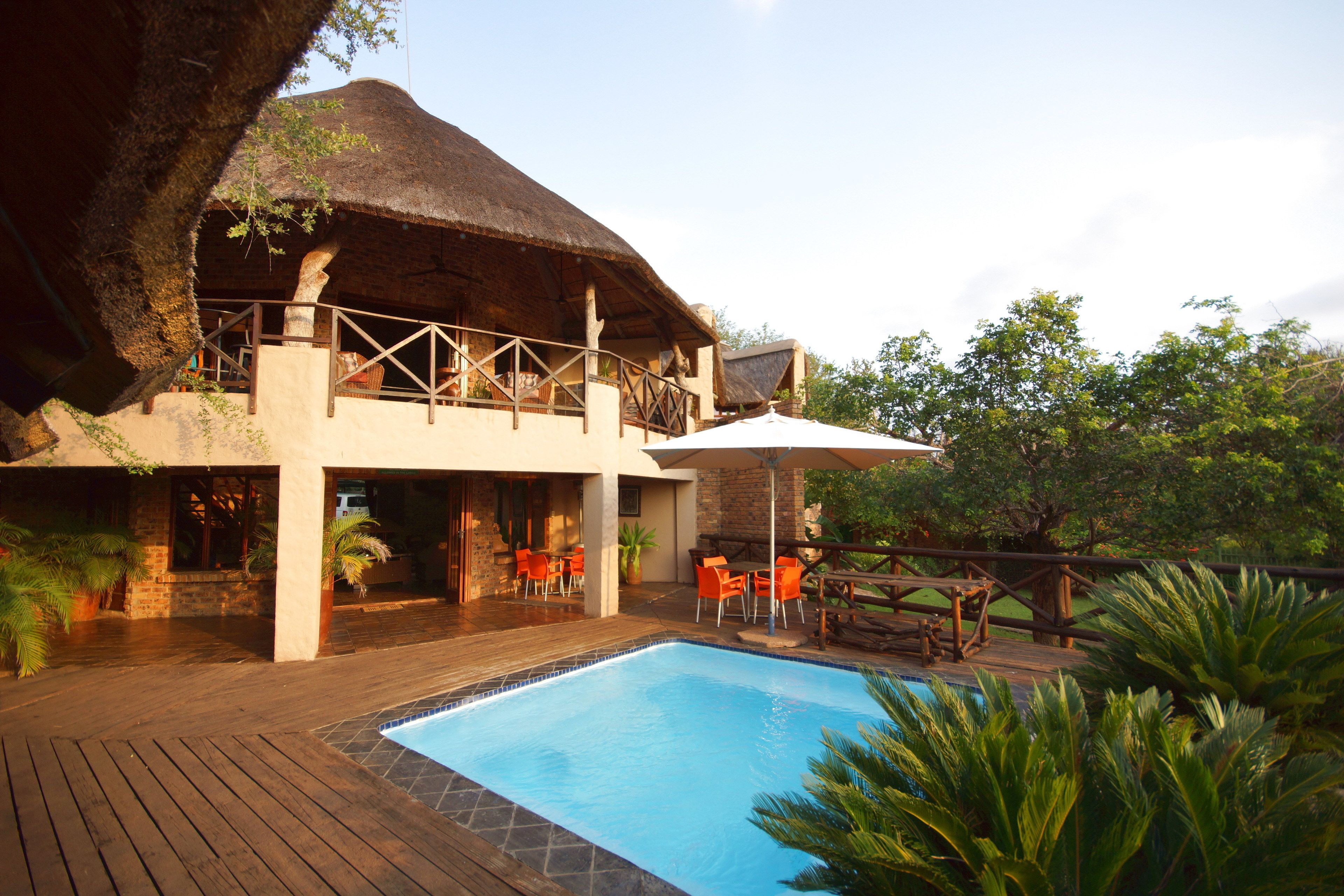 2 outdoor pools, open 6:00 AM to 7:30 PM, pool umbrellas, pool loungers