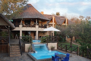 2 outdoor pools, open 6:00 AM to 7:30 PM, pool umbrellas, sun loungers