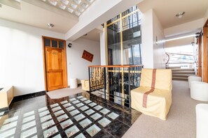 32-inch flat-screen TV with cable channels, TV