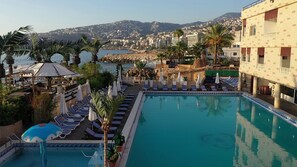 Seasonal outdoor pool, open 9:00 AM to 5:30 PM, pool umbrellas - Lamedina Hotel (Jounieh)