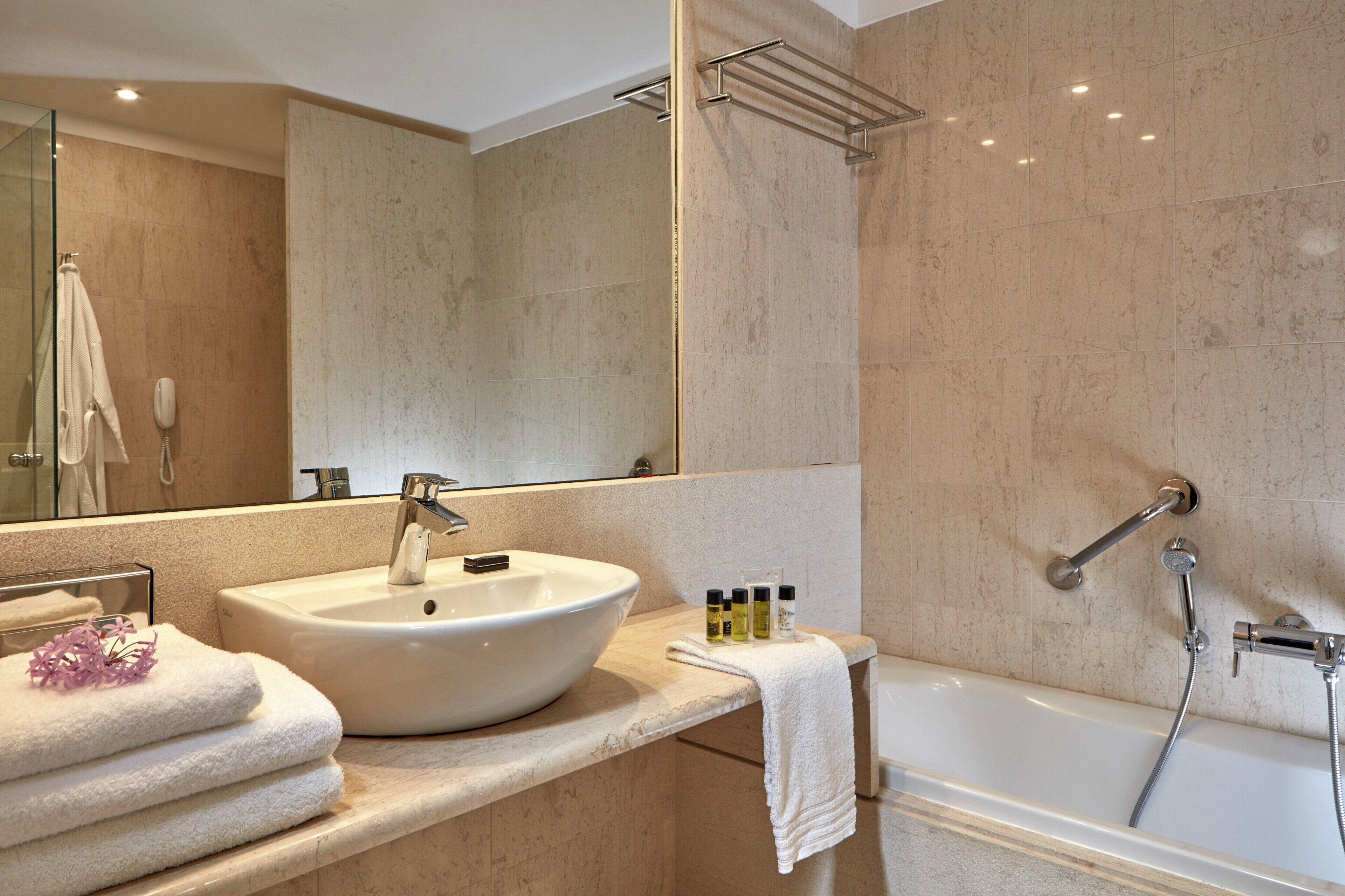 Separate tub and shower, free toiletries, hair dryer, bathrobes