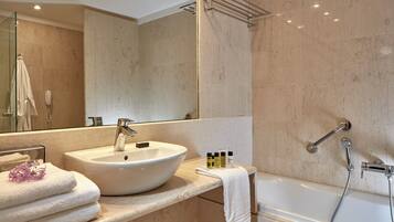 Separate tub and shower, free toiletries, hair dryer, bathrobes