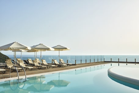 Indoor pool, outdoor pool, pool umbrellas, sun loungers