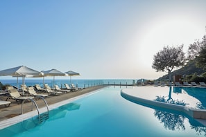 Indoor pool, outdoor pool, pool umbrellas, pool loungers - Atlantica Grand Mediterraneo Resort - Adults Only (Corfu)