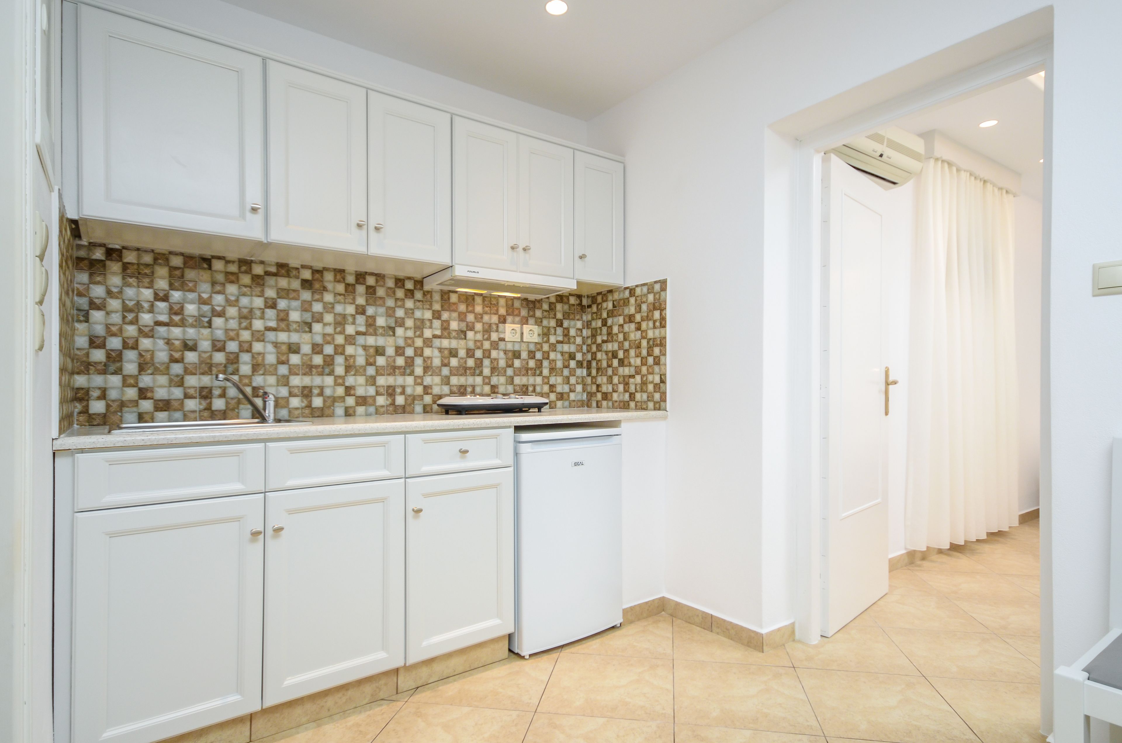 two bedroom apartment for 4 people | private kitchen | fridge, stovetop, electric kettle, toaster