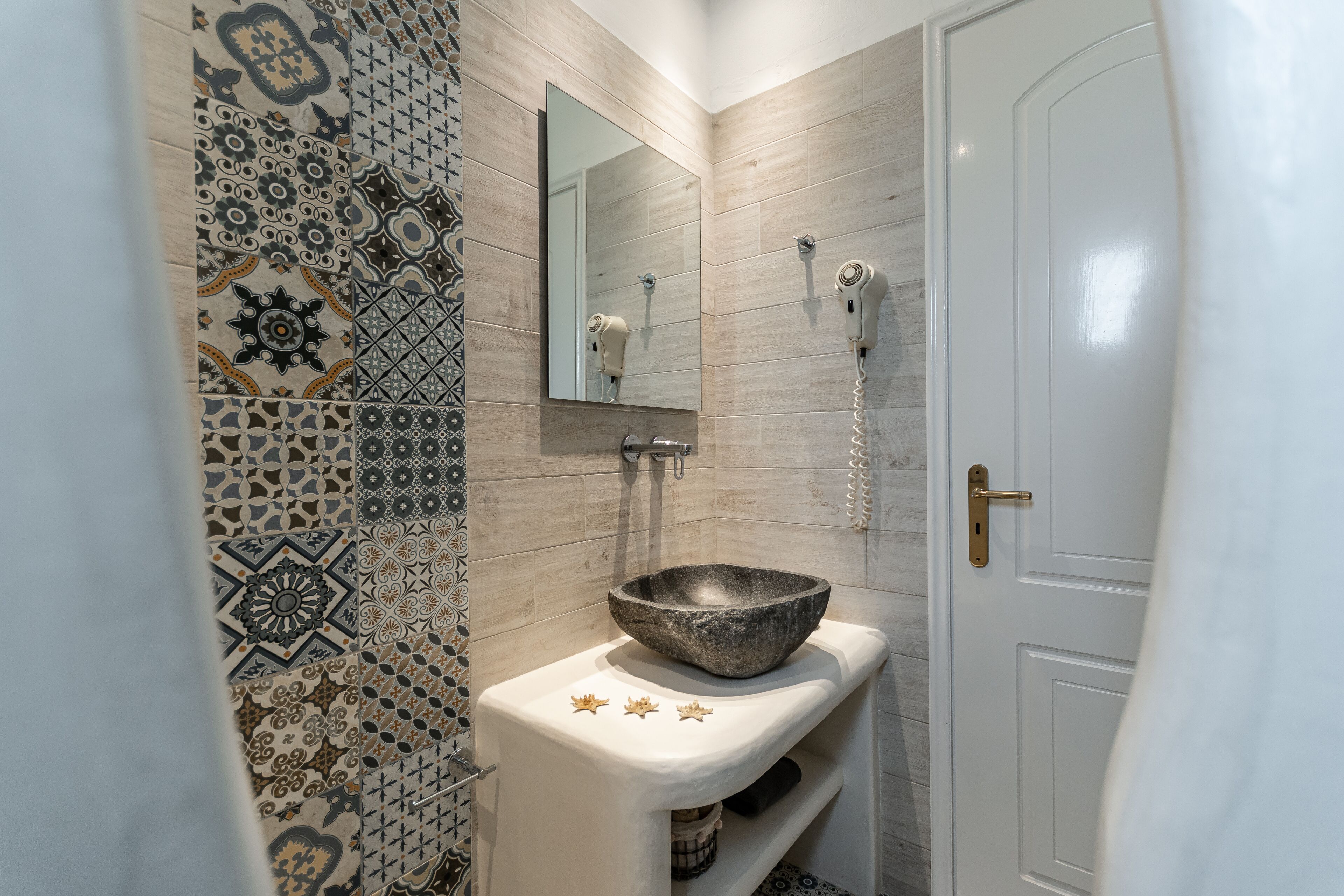 shower, rainfall showerhead, hair dryer, towels