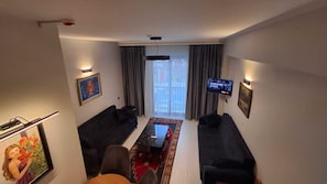 Suite familiale, 1 chambre | Literie de qualité, lit avec matelas à plateau-coussin, minibar