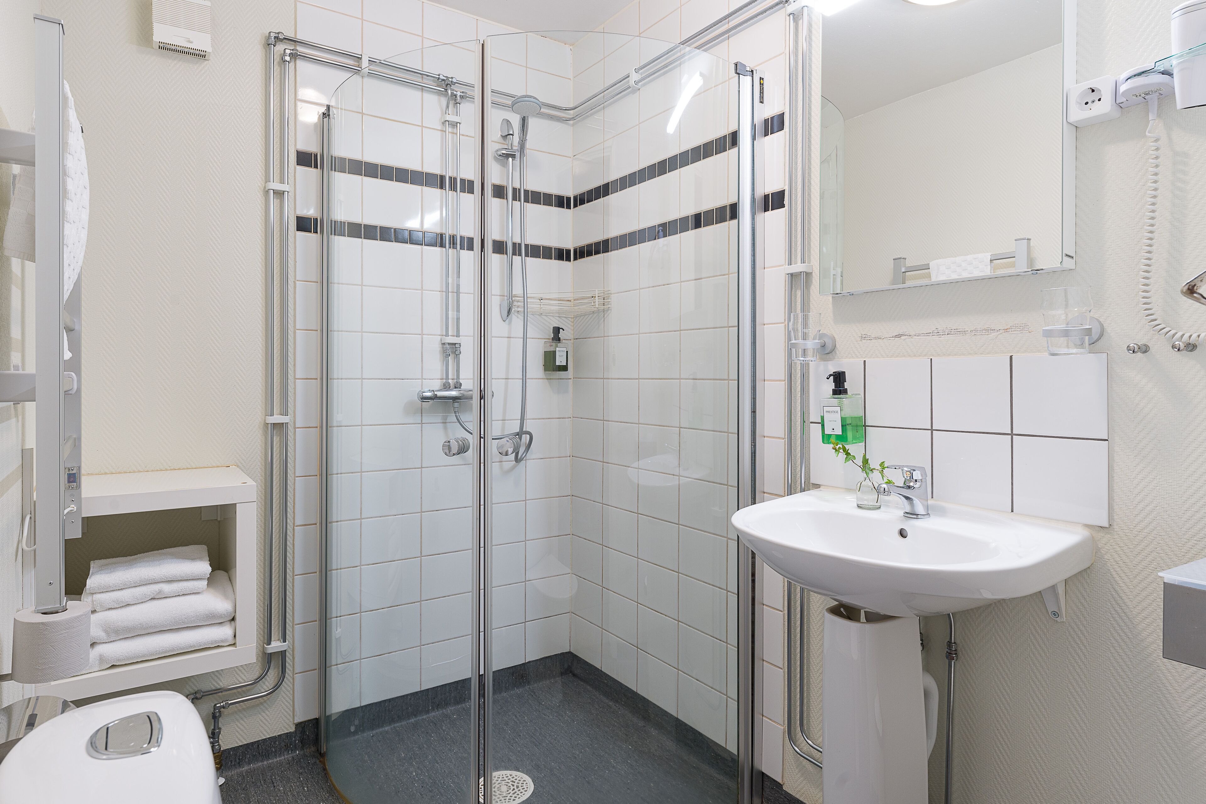 superior room | bathroom | shower, hair dryer, towels