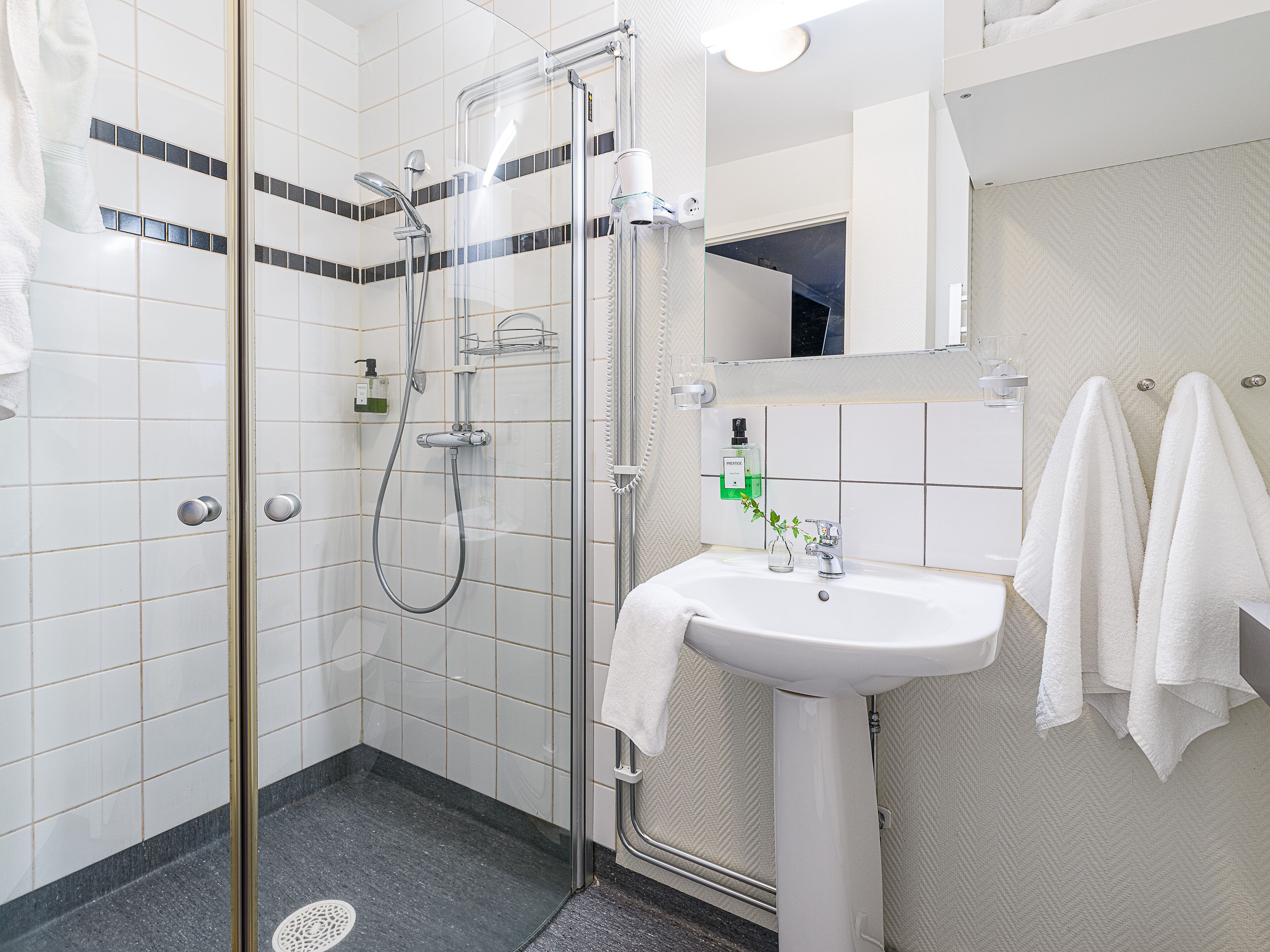 studio | bathroom | shower, hair dryer, towels