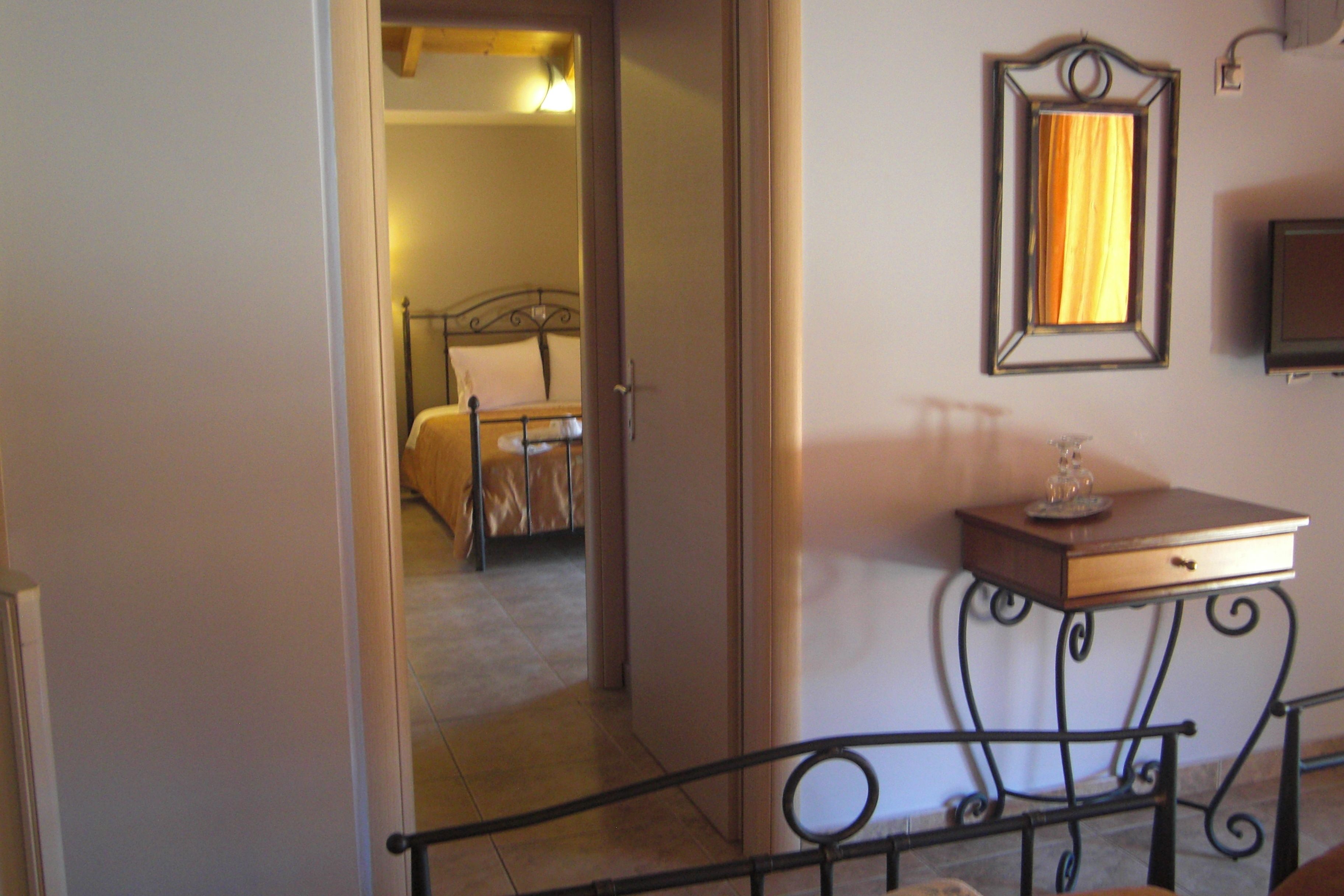 family room, sea view | premium bedding, in-room safe, desk, blackout curtains