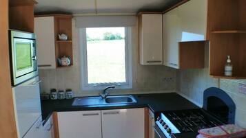 スーペリア シャレー 専用バスルーム | 専用キッチン | ハイチェア