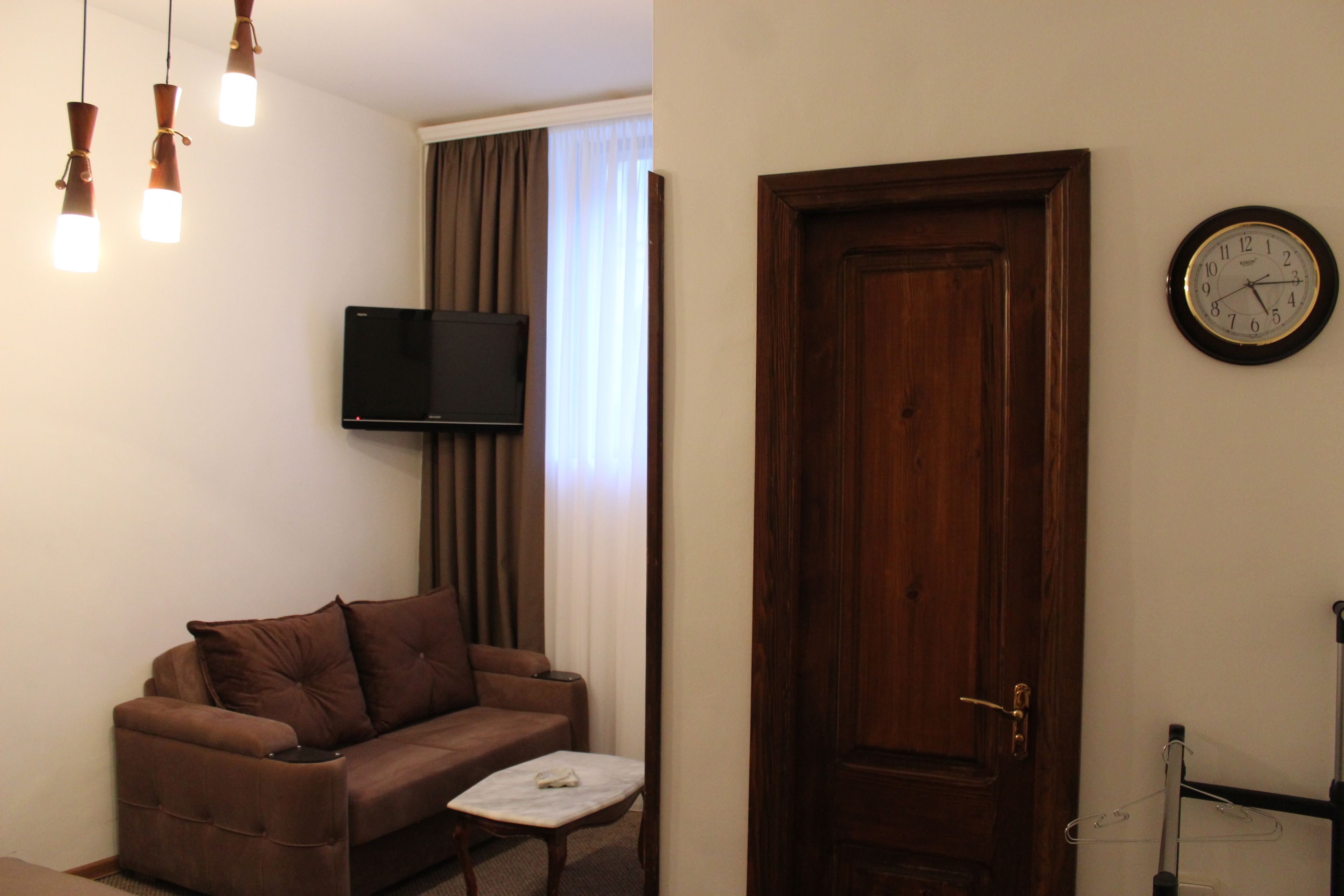 economy room, 1 bedroom | living area | 14-inch tv with satellite channels