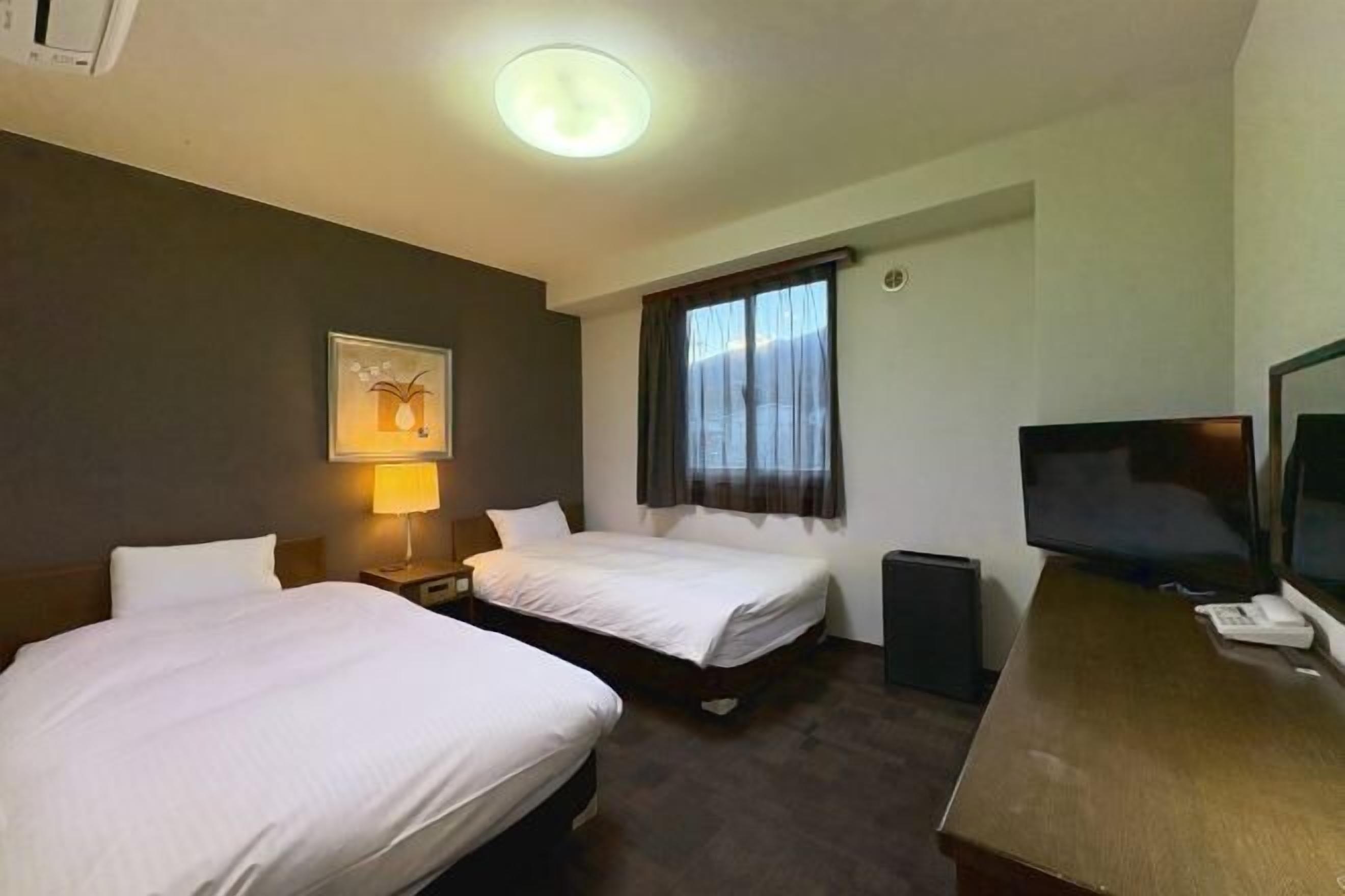 Desk, free WiFi, bed sheets