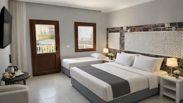 Chambre Triple Standard | Minibar, coffres-forts dans les chambres, chambres insonorisées