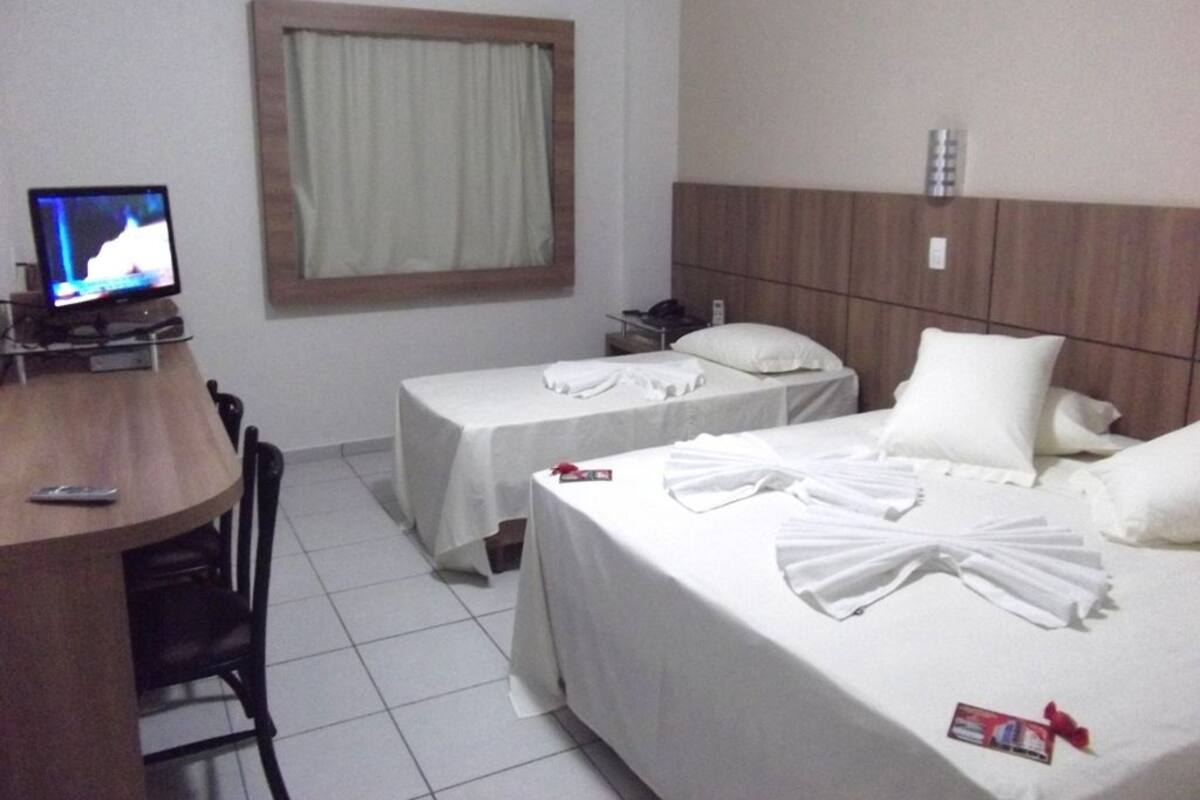 Habitación triple Deluxe | Minibar, wifi gratis, ropa de cama