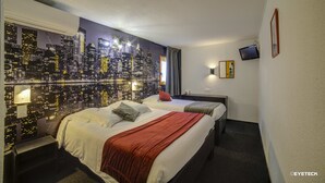 A hotel room with two beds, a cityscape mural, a flat-screen TV, and a nightstand. - The Originals Access Bourges Nord (Saint-Doulchard)